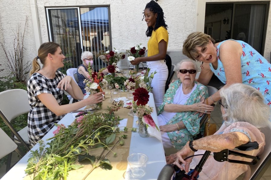 Residents Arranging Flowers at Retirement Community in Woodland Hills